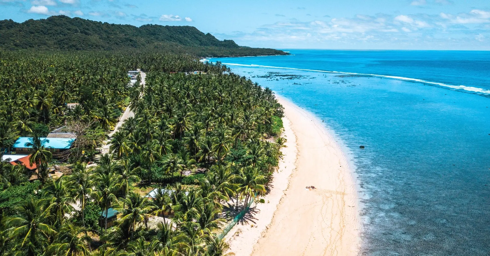 Pacifico Beach in San Isidro - Siargao's premier surf haven and home to the Big Wish left-hand break