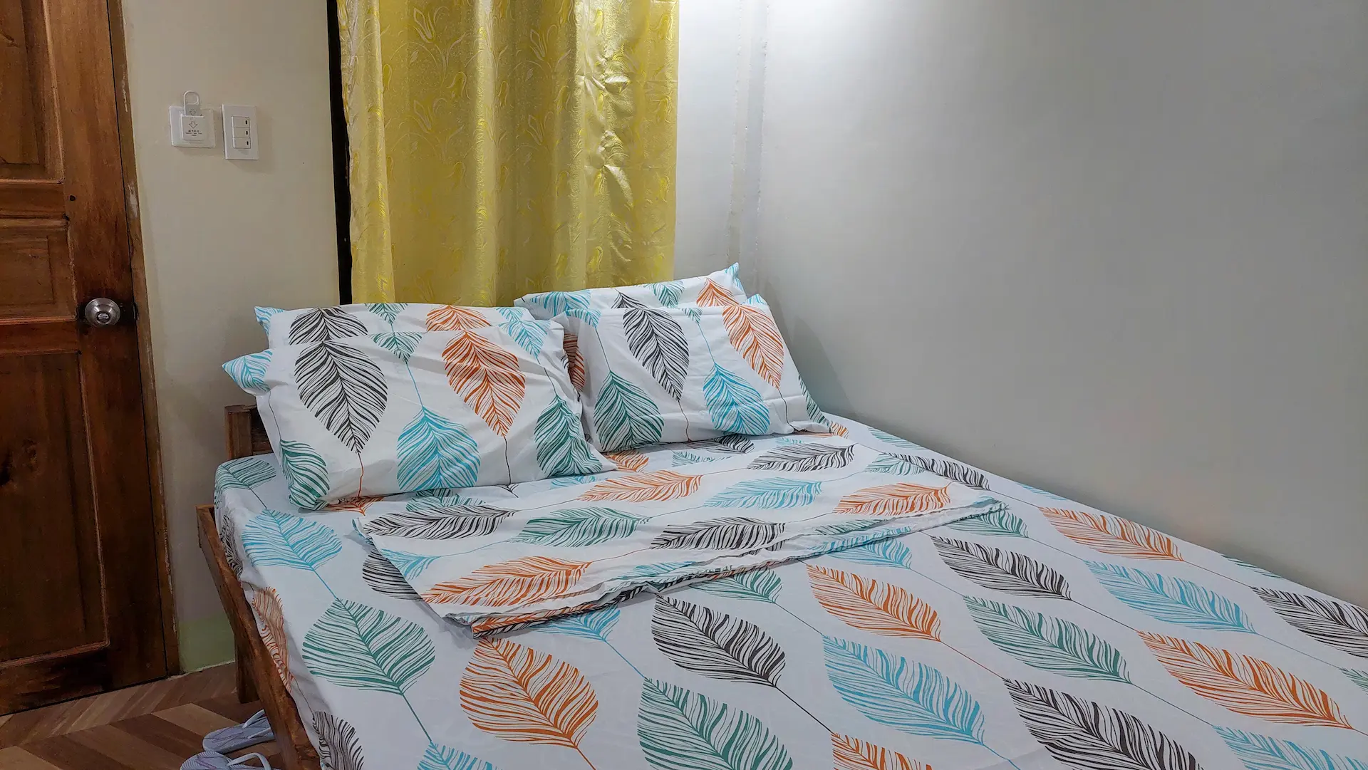 Cozy Double Room at Mariden Resort Del Carmen Siargao near airport - pet-friendly with double bed, private bathroom, air conditioning, and hot shower